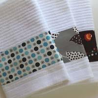 http://www.needlepointers.com/articleimages/Yarnspirations-CustomHandTowels.jpg.ashx?k=link