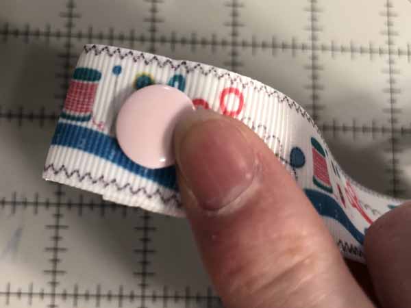 Face Mask Strap Lanyard Tutorial - Place Cap through Ribbon