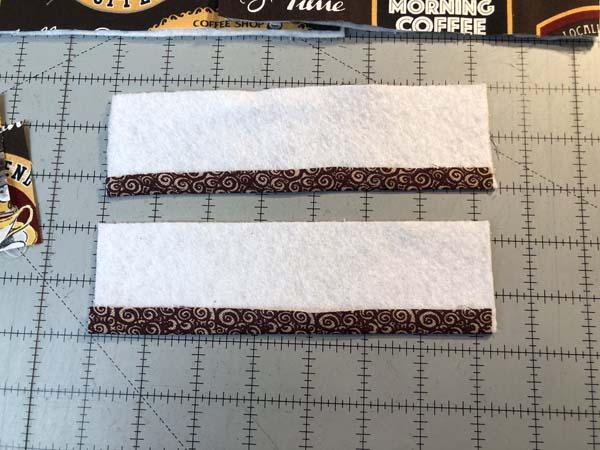 https://www.needlepointers.com/articleimages/Hanging-Towel-3-Fold-Up-Band-edge.jpg