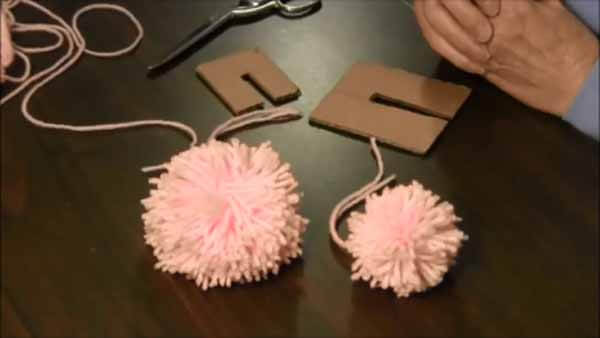 How To Make Yarn Pom Poms Needlepointers Com