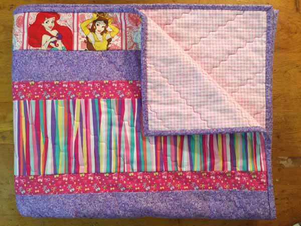 Strip Quilt - Finished and Folded Showing Back