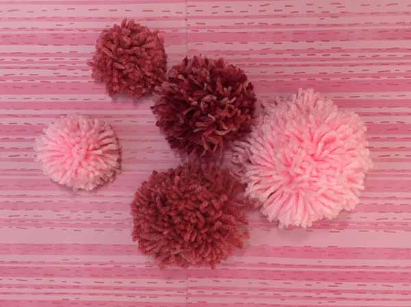 How To Make Yarn Pom Poms Needlepointers Com